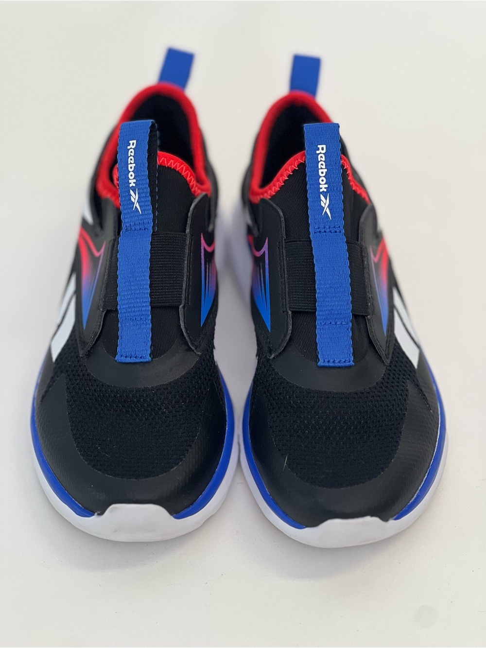 Reebok Kids Black Slip-On Sneakers with Blue & Red Accents - Size 2 kids